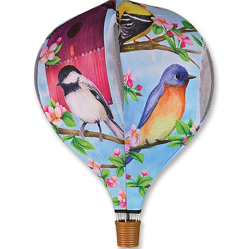 Paddle with bird and floral design
