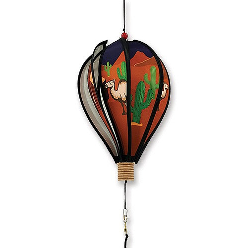 Decorative hot air balloon with desert scene featuring a camel and cacti