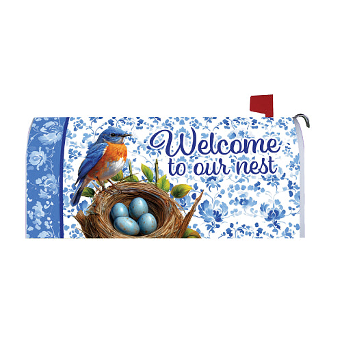Mailbox cover with a bird, nest, and eggs design and 'Welcome to our nest' text on a floral background.