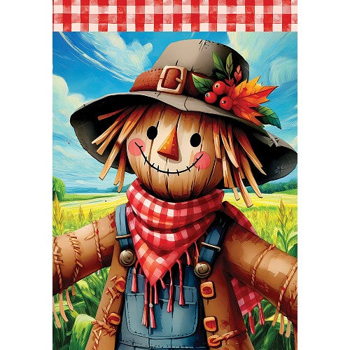 Scarecrow with a checkered scarf in a field with a red and white checkered border