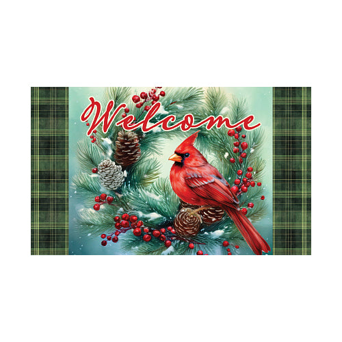 Christmas-themed welcome mat with a red cardinal, pine cones, and berries on a green plaid background.