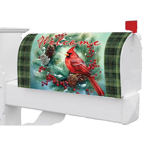 Christmas-themed mailbox cover featuring a cardinal, pine cones, berries, and green plaid edges.