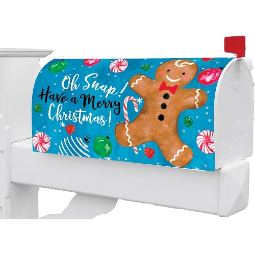Christmas-themed mailbox cover with gingerbread man and candy canes on a blue background