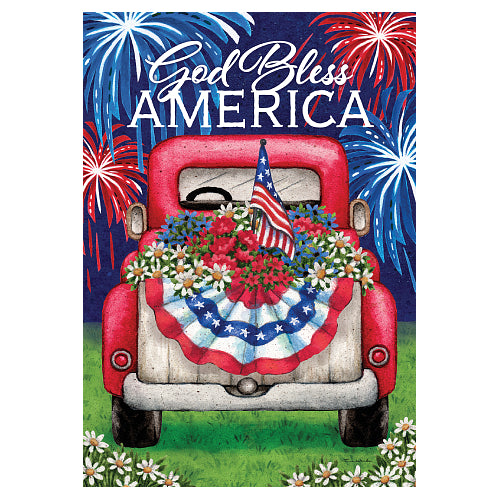 Decorative sign with a red truck, American flag, and 'God Bless America' text against a fireworks background.