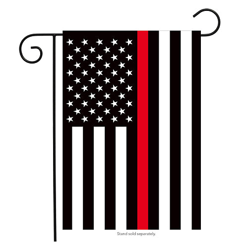 Black and white American flag garden flag with a thin red vertical stripe, known as the Thin Red Line flag, displayed on a decorative metal stand to honor firefighters.