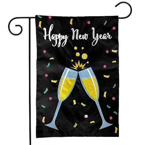 Decorative garden flag with 'Happy New Year' text and champagne glasses on a black background.