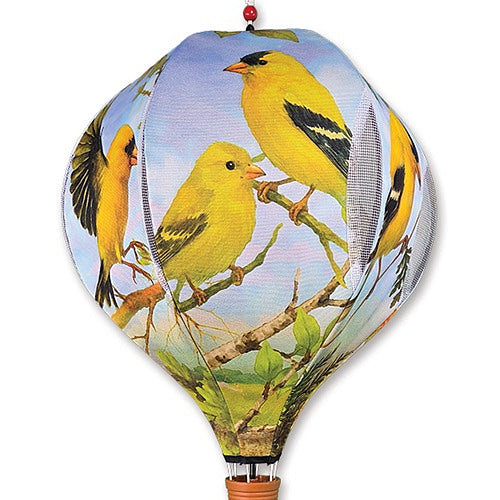 Detail of a hanging hot air balloon spinner with images of goldfinches on branches