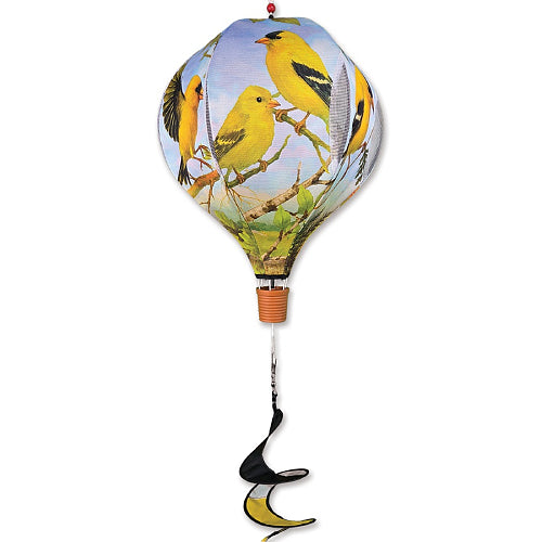 Decorative hot air balloon spinner with yellow birds on a branch design with a curly tail.