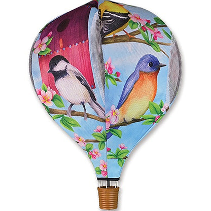 Paddle with bird and floral design