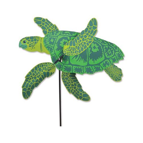 A green sea turtle wind spinner with a detailed patterned design, mounted on a black stake against a plain white background.