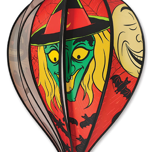 Vintage Halloween hot air balloon spinner detail showing witch face and grinning moon