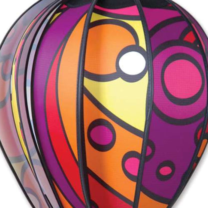 Colorful abstract design with concentric circles in purple, orange, and pink.