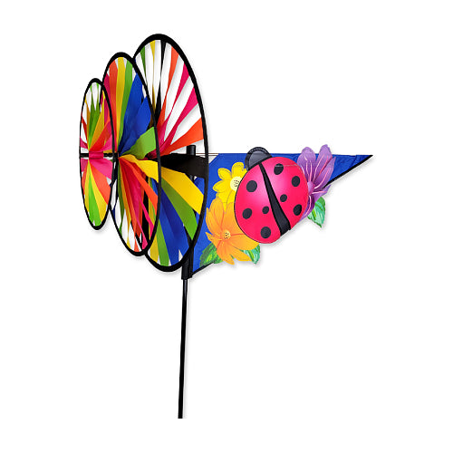 Colorful, three wheeled wind spinner with a ladybug and flowers.