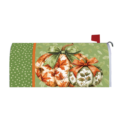 Mailbox cover with pumpkins and ribbons on a green background