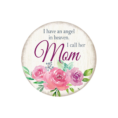 Round decorative sign with a distressed white wood background, featuring the text 'I have an angel in heaven. I call her Mom' above a watercolor floral design of pink and purple roses with green leaves.