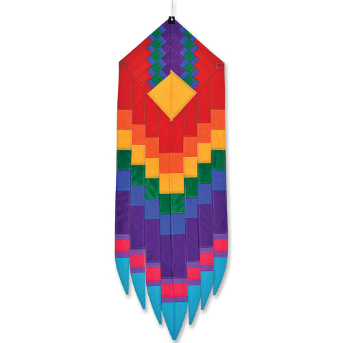 A colorful woven wall hanging or decorative banner with a geometric pattern, featuring red, orange, yellow, green, blue, purple, pink, and light blue sections, shown against a plain white background.