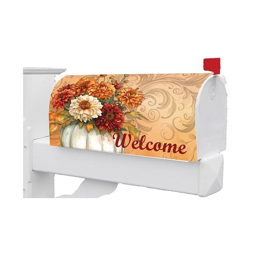 Decorative fall-themed cover featuring a white pumpkin and flowers.