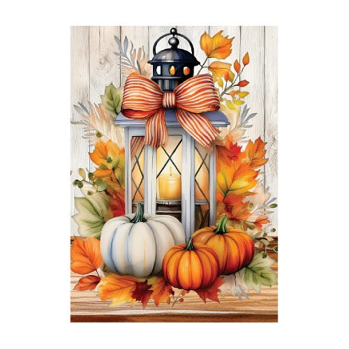 Decorative image with lantern, pumpkins, and autumn leaves on a wooden surface.