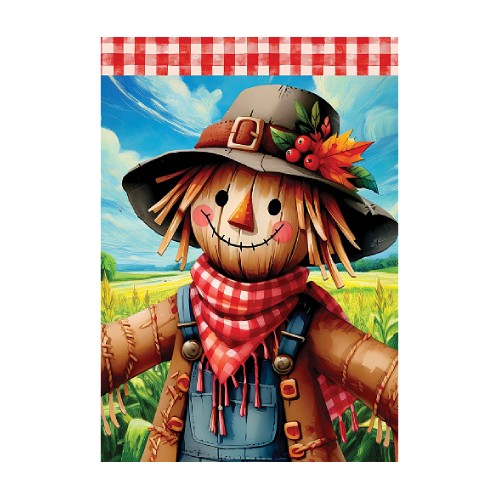 Scarecrow with a checkered scarf in a field with a blue sky and clouds.
