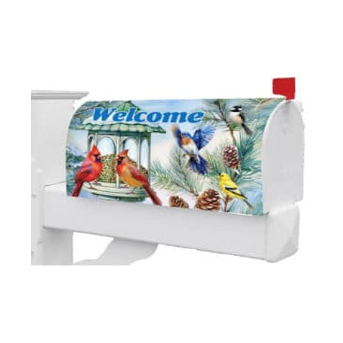 Decorative mailbox cover with birds around a bird feeder and 'Welcome' text on a background of a pine tree.