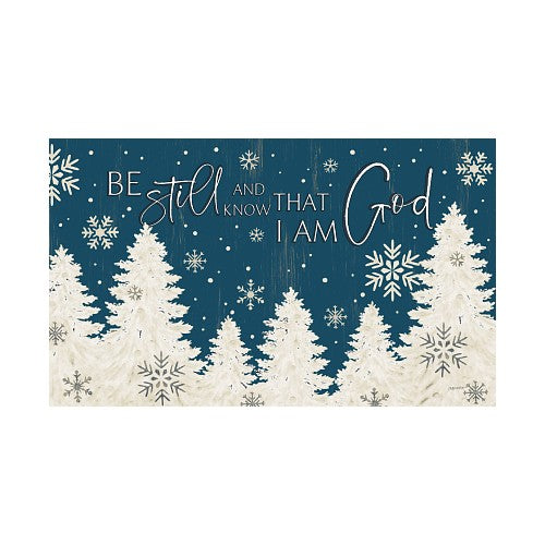 Winter scene with trees and snowflakes and text 'Be still and know that I am God' on a blue background