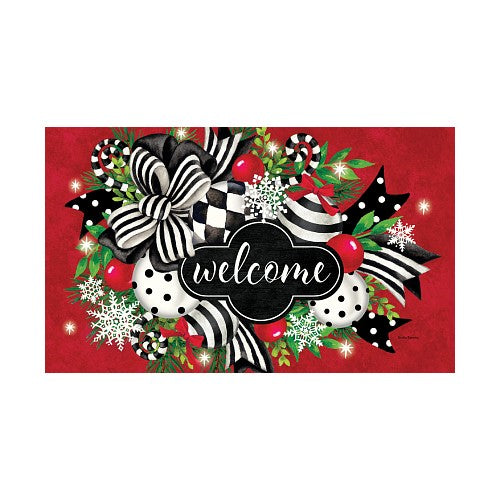 Decorative mat with a black and white checkered bow, red berries, and snowflakes on a red background with 'welcome' text.