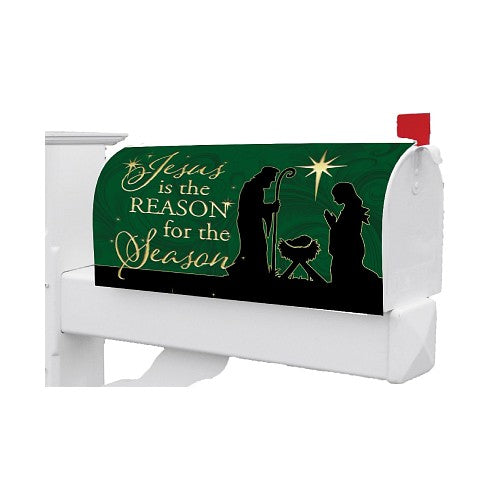 Decorative mailbox cover with Christmas nativity scene and text reading: Jesus is the reason for the season on a dark green background