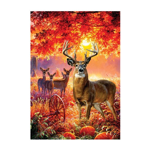 Deer in a forest with autumn leaves and pumpkins