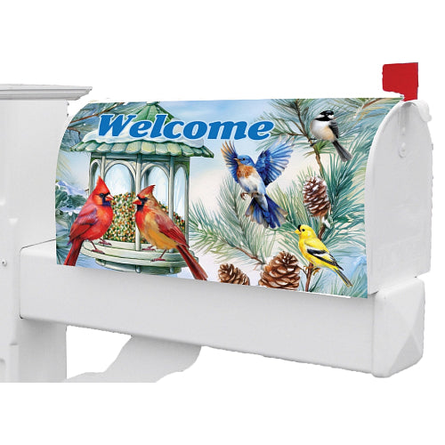 Decorative mailbox cover with birds, a bird feeder on a pine tree and 'Welcome' text.