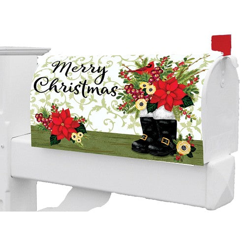 Decorative mailbox cover with Christmas design featuring poinsettias, boots, and wreath on a white background.