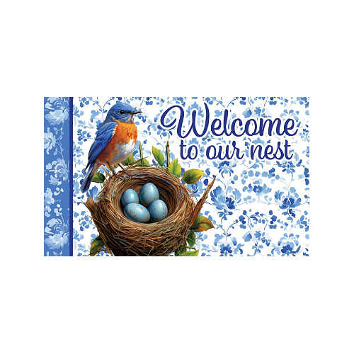 Decorative doormat with a bluebird, nest, and eggs on a floral background with 'Welcome to our nest' text.