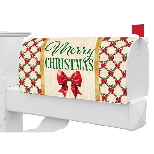 Christmas-themed mailbox cover with red bow and 'Merry Christmas' text on an off- white background