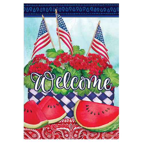 Decorative flag with American flags, watermelon slices, and red flowers on a blue and white checkered tablecloth.