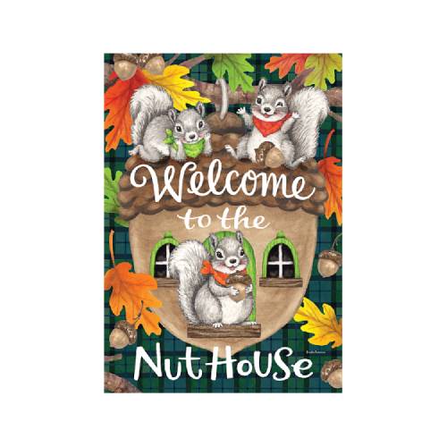 A decorative sign or print featuring three illustrated squirrels around a nut house with the words 'Welcome to the Nut House.' The design includes autumn leaves, and acorns