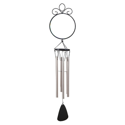 A wind chime with a black metal circular top for interchangeable Suncatchers. Decorative scrollwork, multiple silver-toned hanging tubes, and a black teardrop-shaped striker at the bottom.