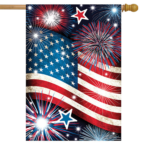American flag with stars and fireworks on a night sky
