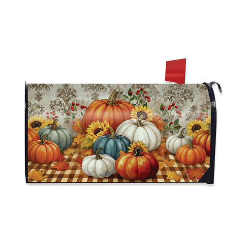 Mailbox cover with pumpkins and autumn leaves design on a checkered tablecloth